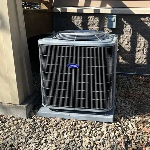 Carrier brand AC unit outside Bloomington home